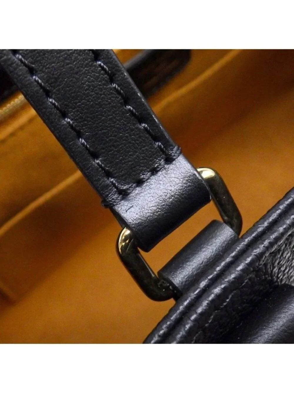 Louis Vuitton Tote on the Go MM Black Monogram Empreinte Leather Gold